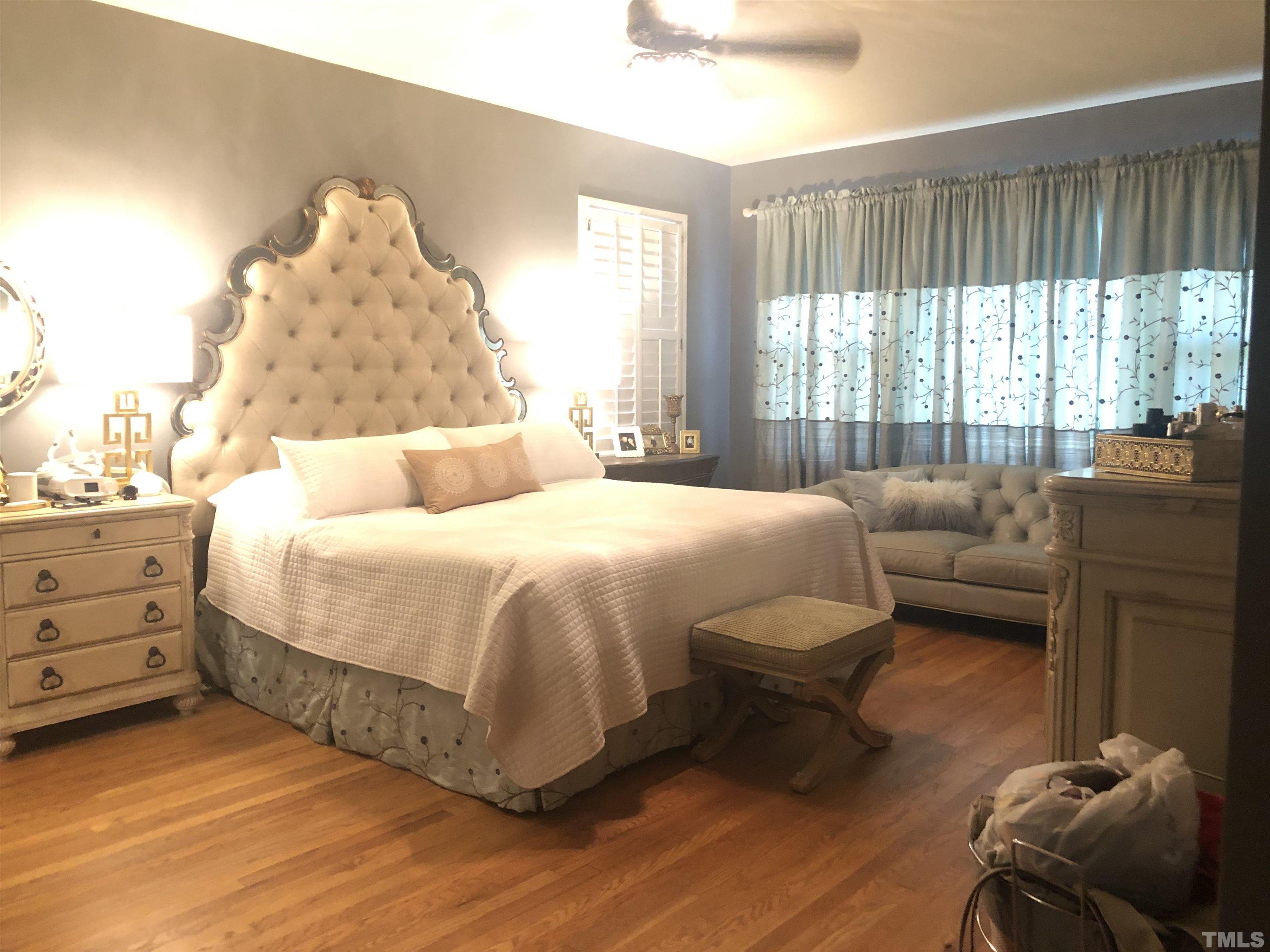 910 Marrow Drive Henderson, NC 27536 - Photo 19 of 30 a bedroom with bed and window