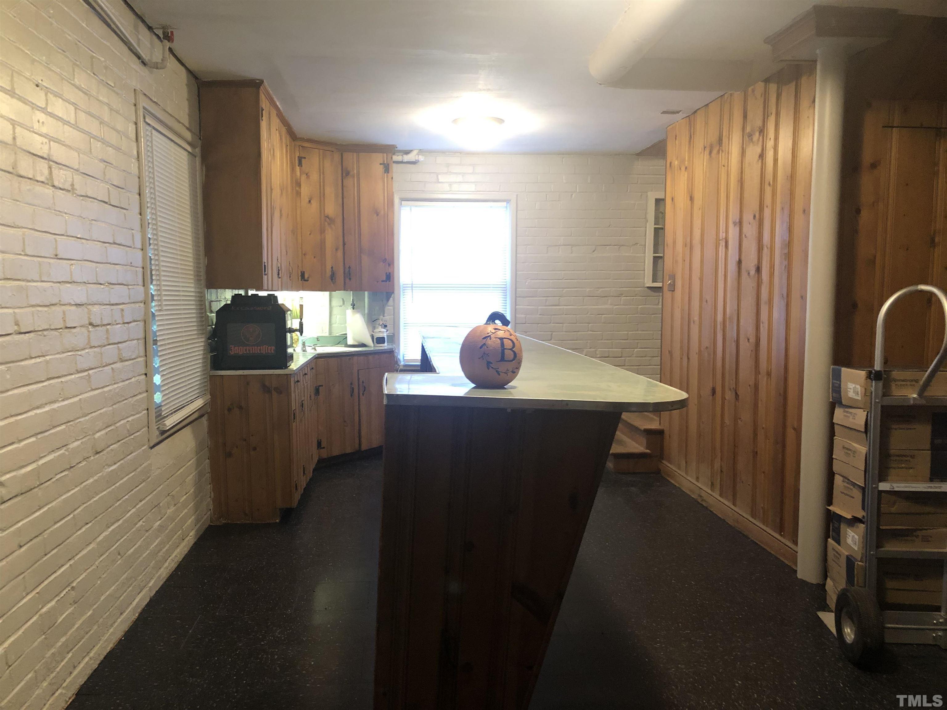 910 Marrow Drive Henderson, NC 27536 - Photo 26 of 30 a living room with furniture and a window