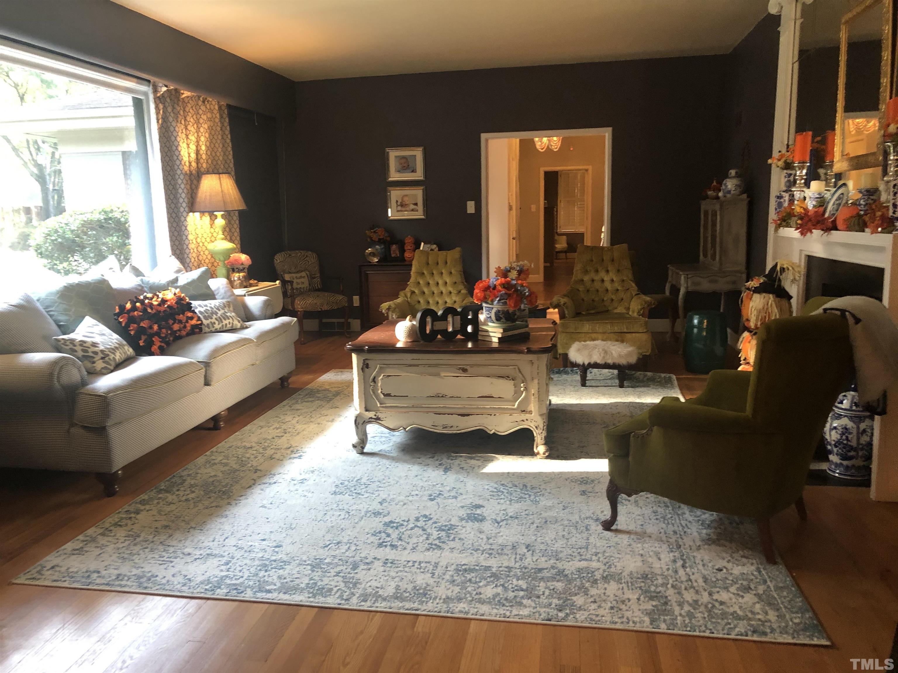 910 Marrow Drive Henderson, NC 27536 - Photo 8 of 30 a living room with furniture and a large window