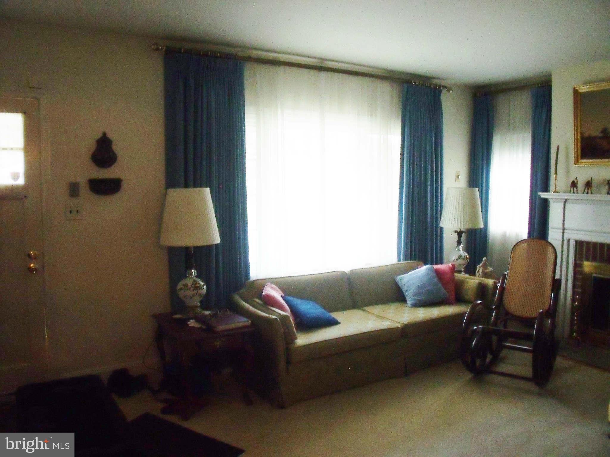 1209 Orems Road Baltimore, MD 21220 - Photo 13 of 29 a living room with furniture and a window