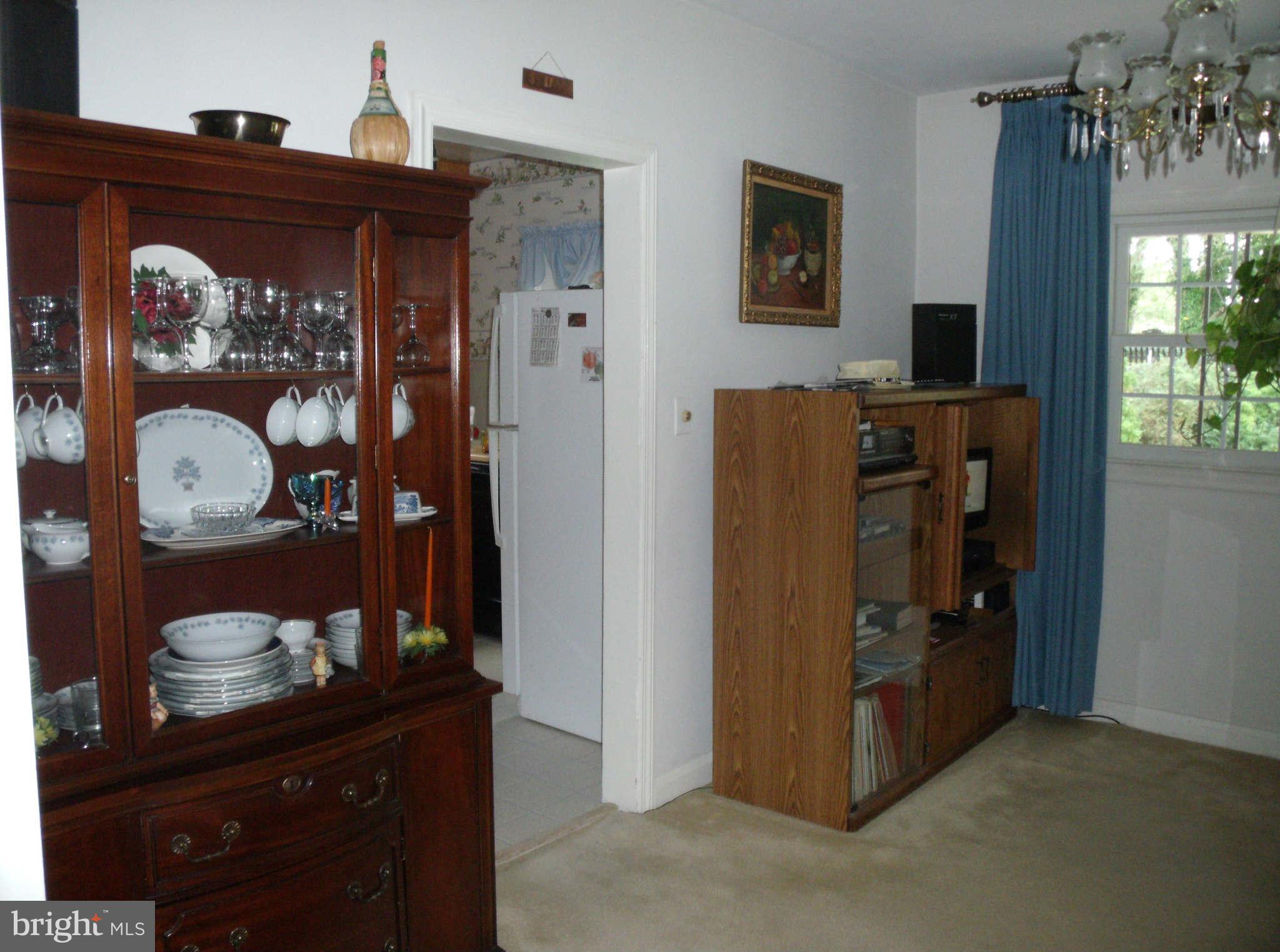 1209 Orems Road Baltimore, MD 21220 - Photo 17 of 29 a view of living room with furniture and flat screen tv