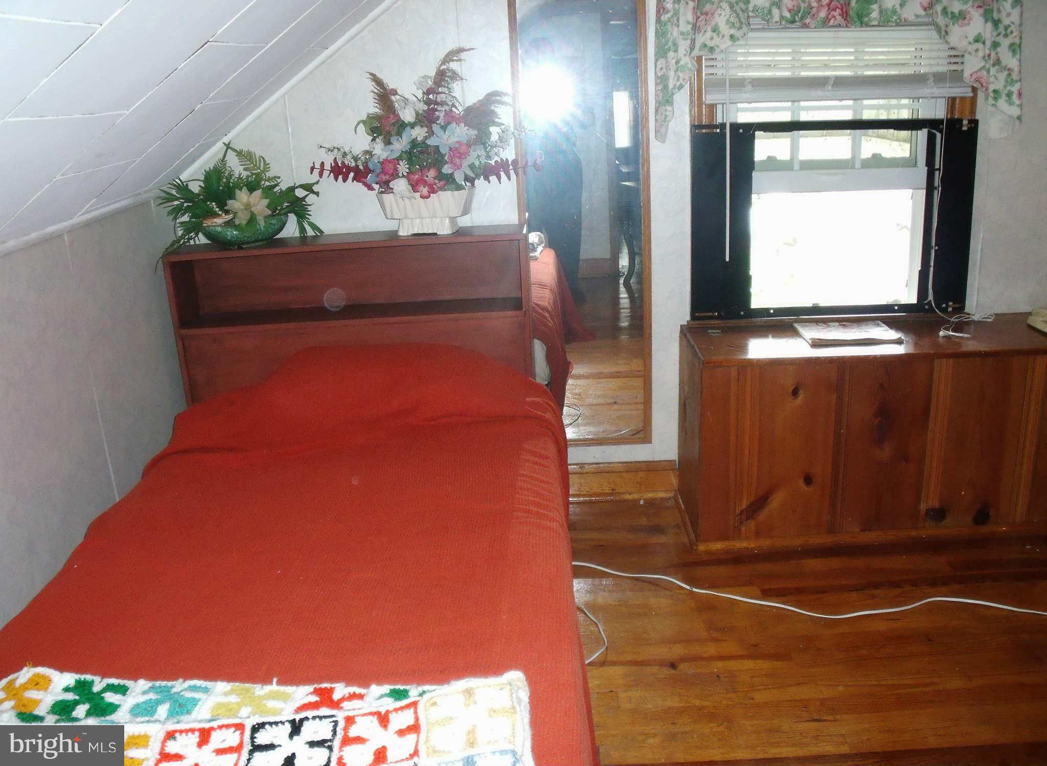 1209 Orems Road Baltimore, MD 21220 - Photo 24 of 29 a room with table and chairs