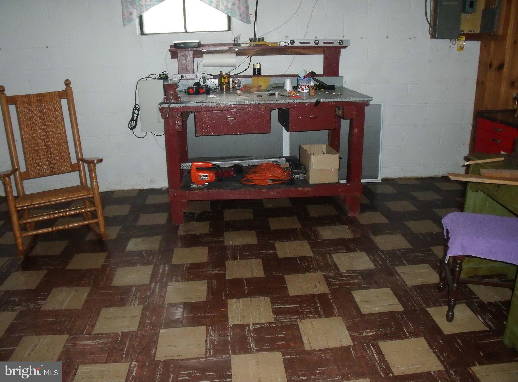 1209 Orems Road Baltimore, MD 21220 - Photo 25 of 29 a room with furniture and a mirror