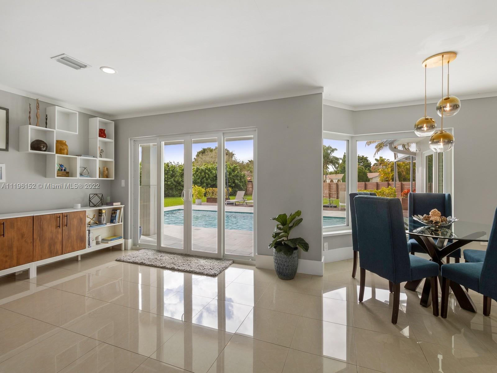 14250 Southwest 97th Avenue Miami, FL 33176 - Photo 12 of 38 a dining room with furniture and window
