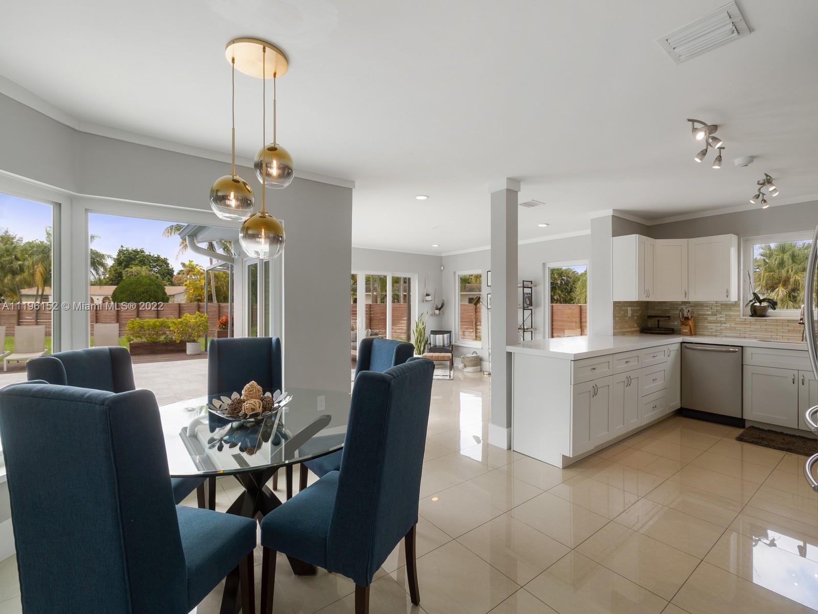 14250 Southwest 97th Avenue Miami, FL 33176 - Photo 13 of 38 a dining room with furniture and window