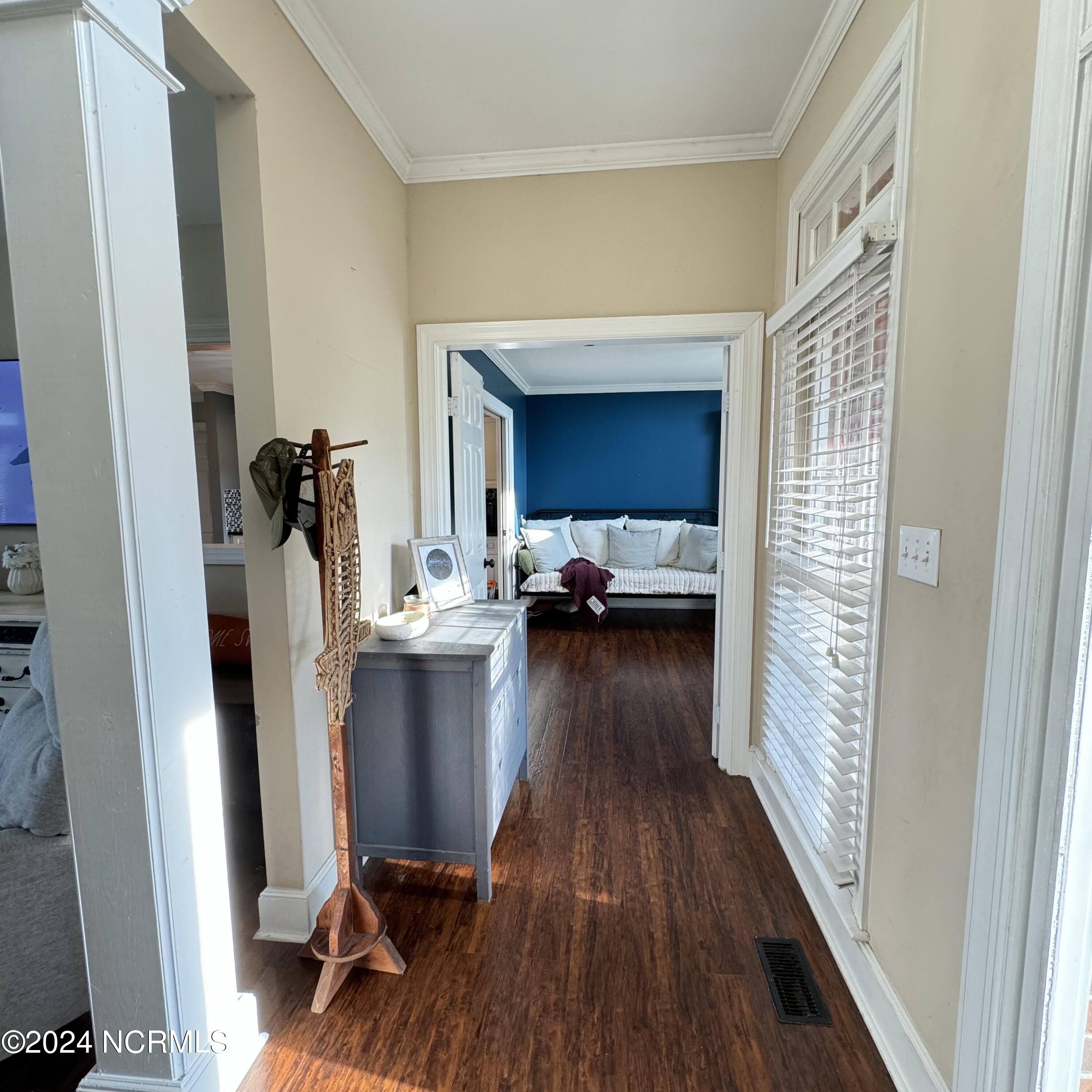 125 Saddle Ridge Road Kinston, NC 28501 - Photo 14 of 36 Entering the front door, hallway to the right leads to the formal dining room/ kitchen access.