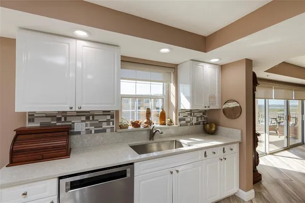 a kitchen with a stove and a microwave
