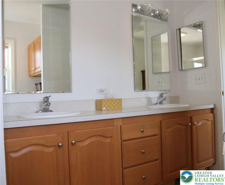 712 Winterthur Way Easton, PA 18040 - Photo 16 of 20 a bathroom with a sink double vanity and a mirror
