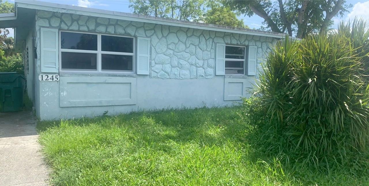 1245 West 23rd Street Riviera Beach, FL 33404 - Photo 1 of 8 front