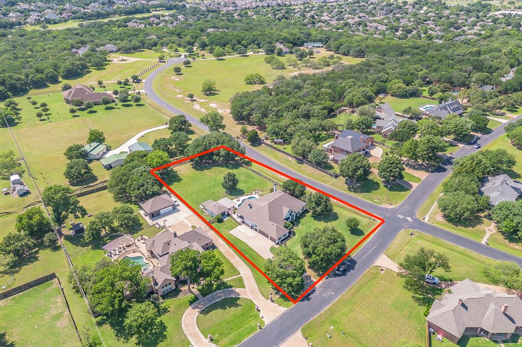 115 Pheasant Run Road Argyle, TX 76226 - Photo 2 of 40 an aerial view of a city