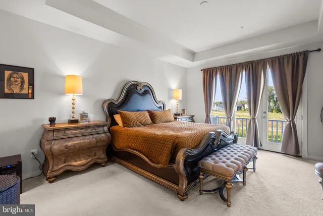 a bed room with a bed and a window