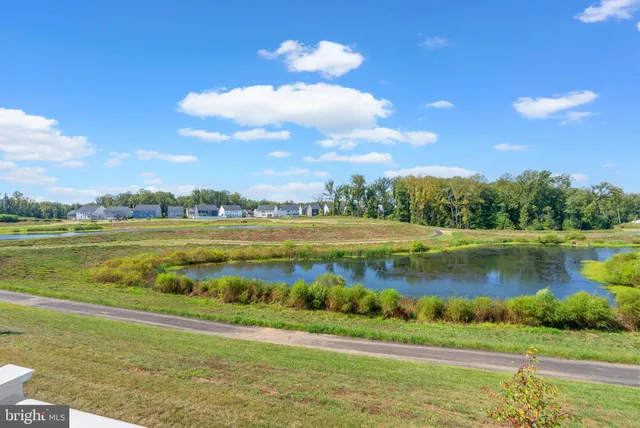 a view of a lake with a big yard