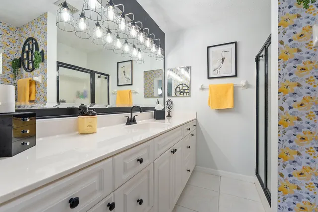 a patio with water view fountain and a table