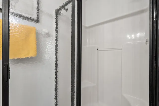 a view of a swimming pool with a lounge chairs