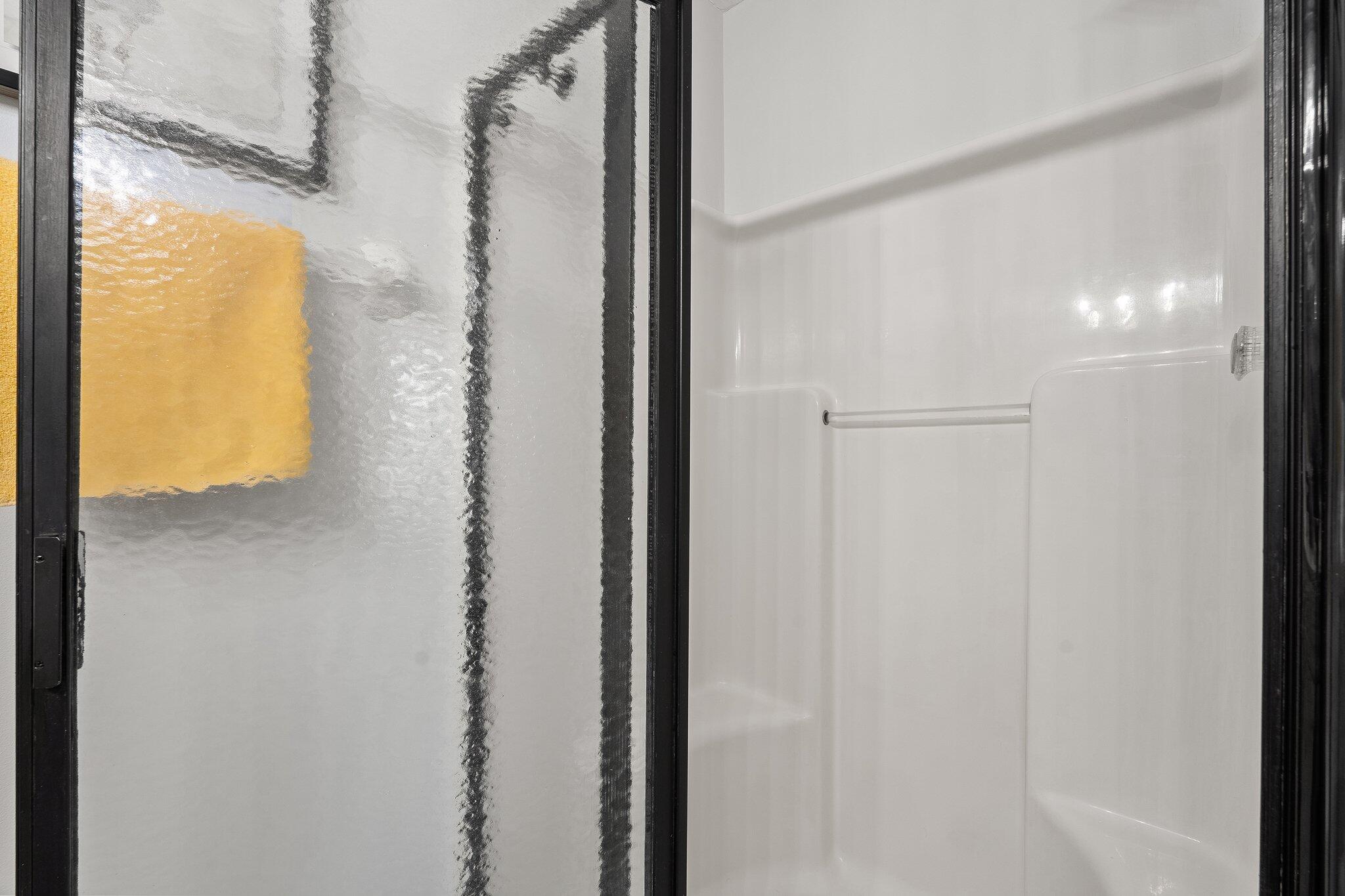 2186 Southeast Wild Meadow Circle Port St. Lucie, FL 34952 - Photo 36 of 57 a bathroom with a shower