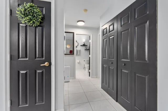 a view of a swimming pool with lounge chairs