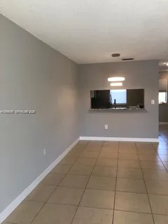 a view of a livingroom with furniture