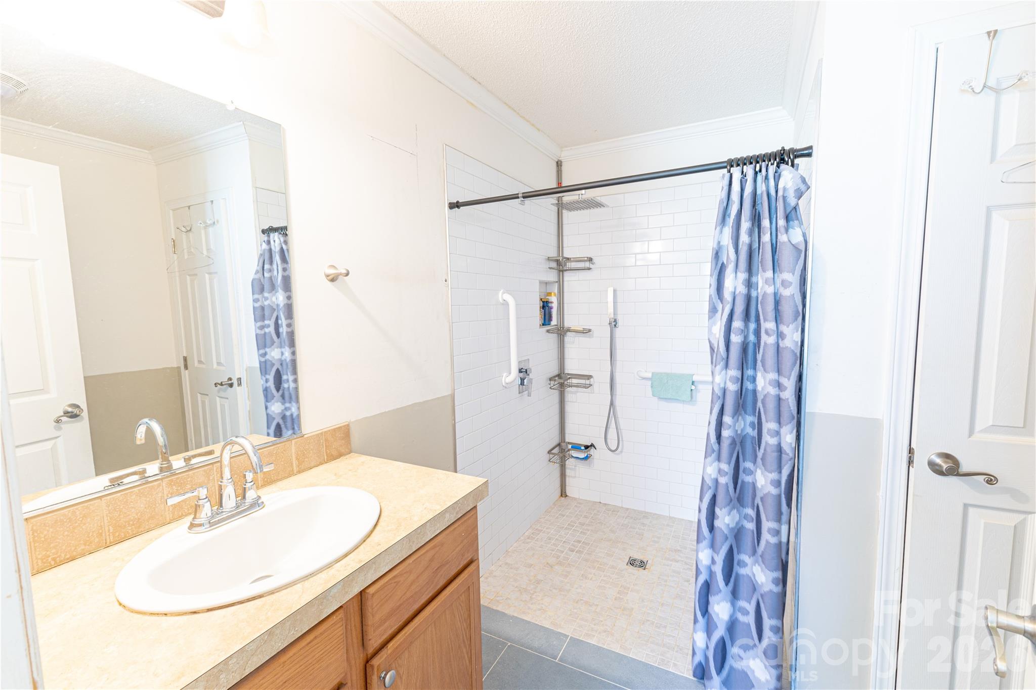 111 Berry Street Fort Mill, SC 29715 - Photo 12 of 19 a bathroom with a sink and a mirror