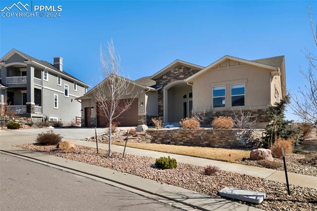 12457 Carmel Ridge Road Colorado Springs, CO 80921 - Photo 2 of 2 View of front facade with a garage