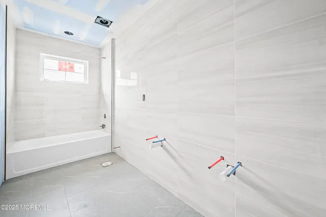 a bathroom with a bathtub