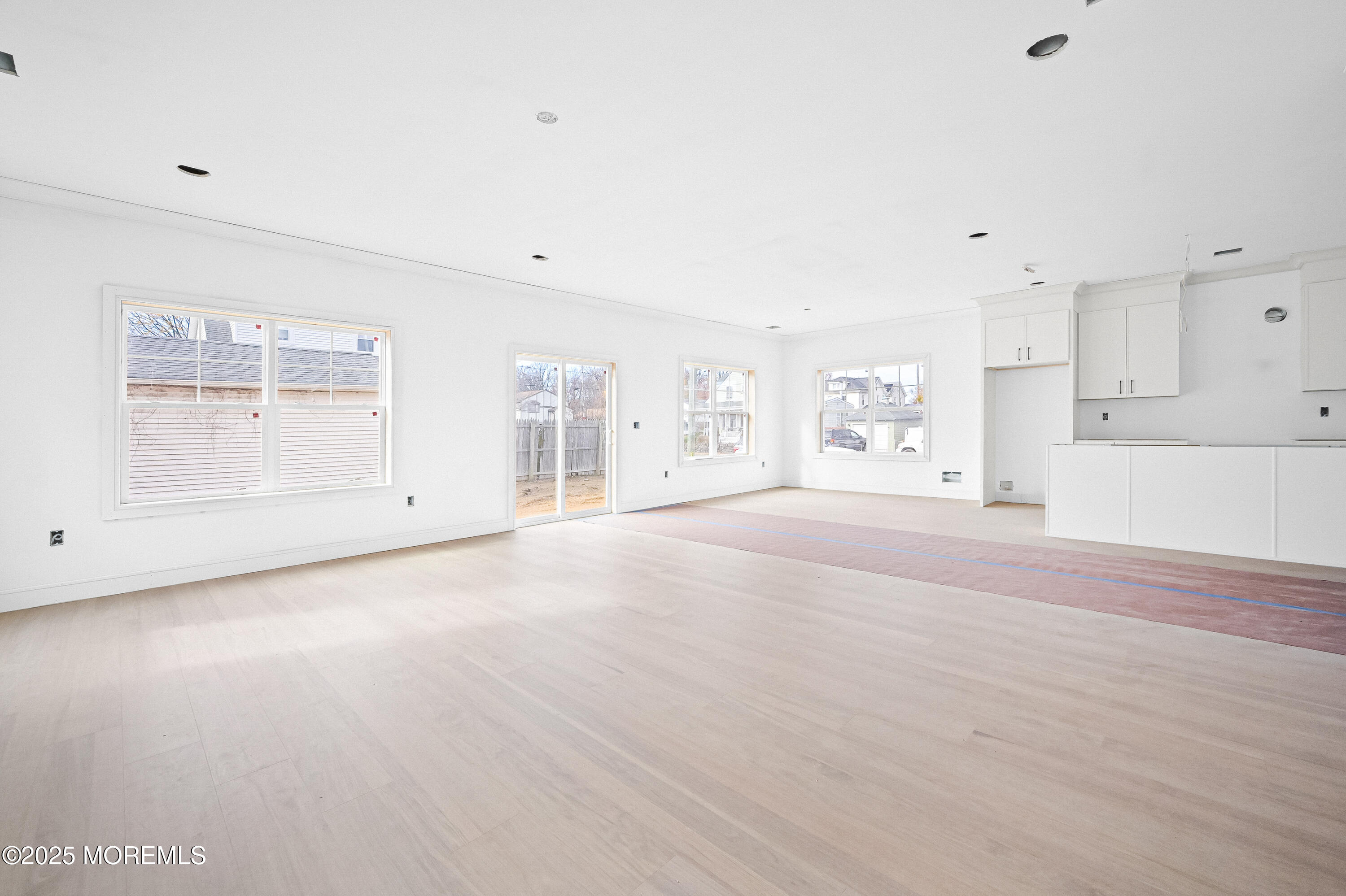 74 Manchester Avenue Keyport, NJ 07735 - Photo 6 of 14 a view of an empty room with a kitchen