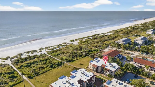 a view of a balcony with an ocean view