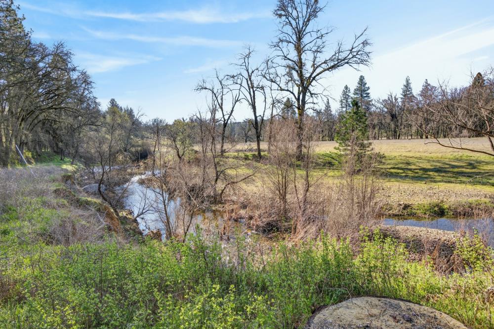 3150 Bridgeport School Road Fiddletown, CA 95629 - Photo 18 of 48 a view of a lake with lots of green space