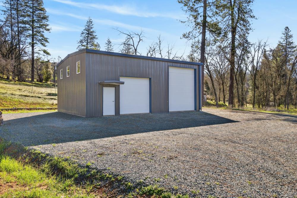 3150 Bridgeport School Road Fiddletown, CA 95629 - Photo 8 of 48 a view of a house with a yard