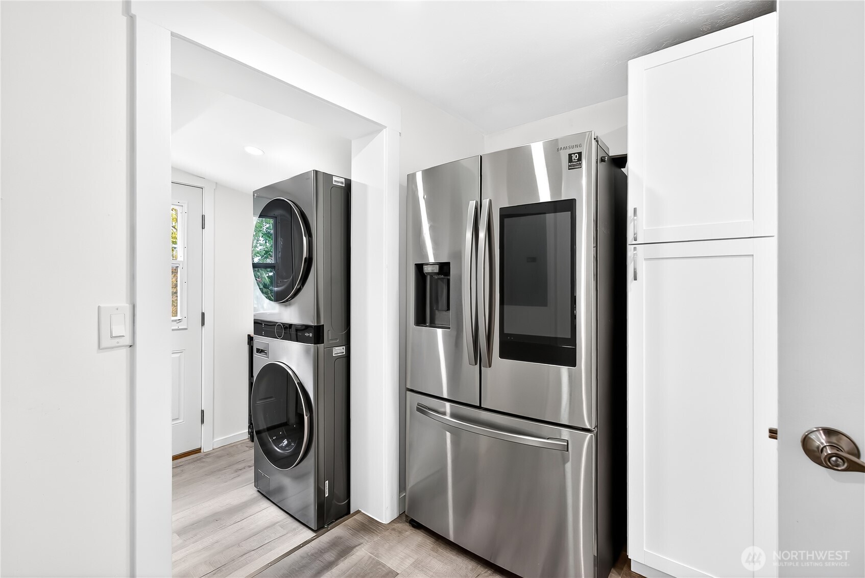 6583 Goodwin Road Everson, WA 98247 - Photo 13 of 40 a view of kitchen with stainless steel appliances refrigerator and cabinets