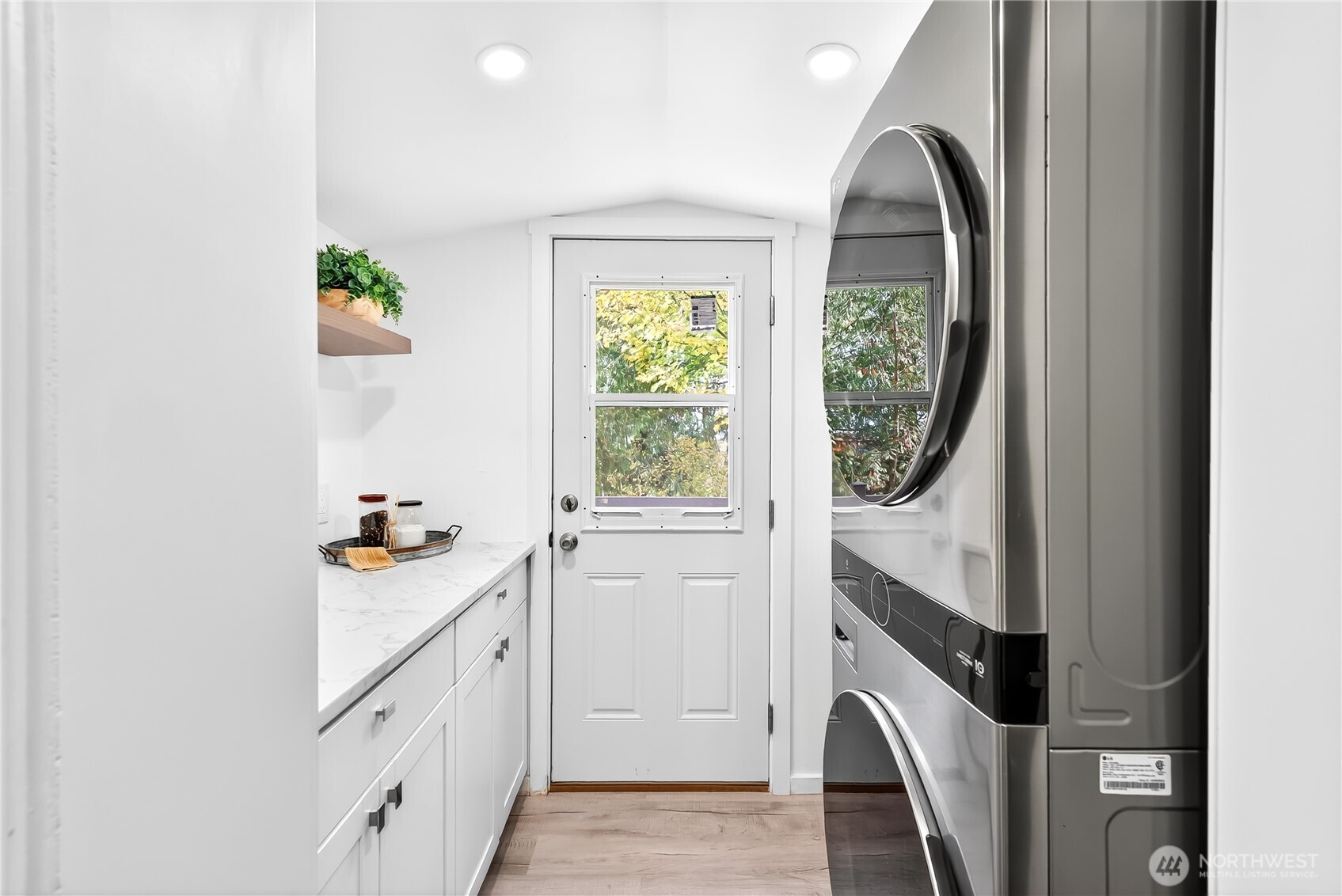 6583 Goodwin Road Everson, WA 98247 - Photo 14 of 40 a utility room with window washer and dryer