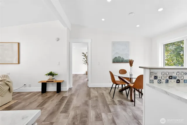 a living room with furniture and a table