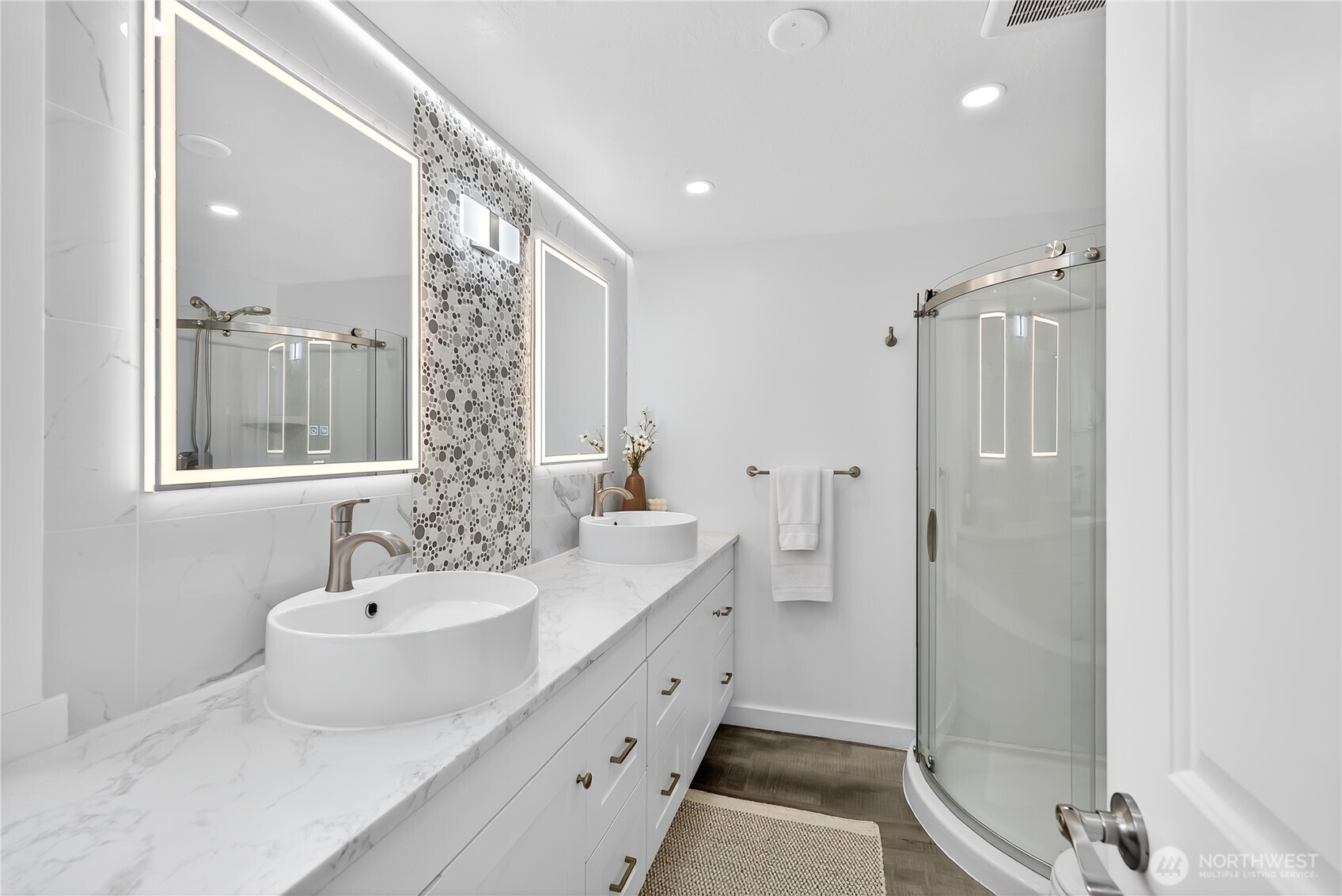 6583 Goodwin Road Everson, WA 98247 - Photo 18 of 40 a spacious bathroom with a double vanity sink a mirror and a shower