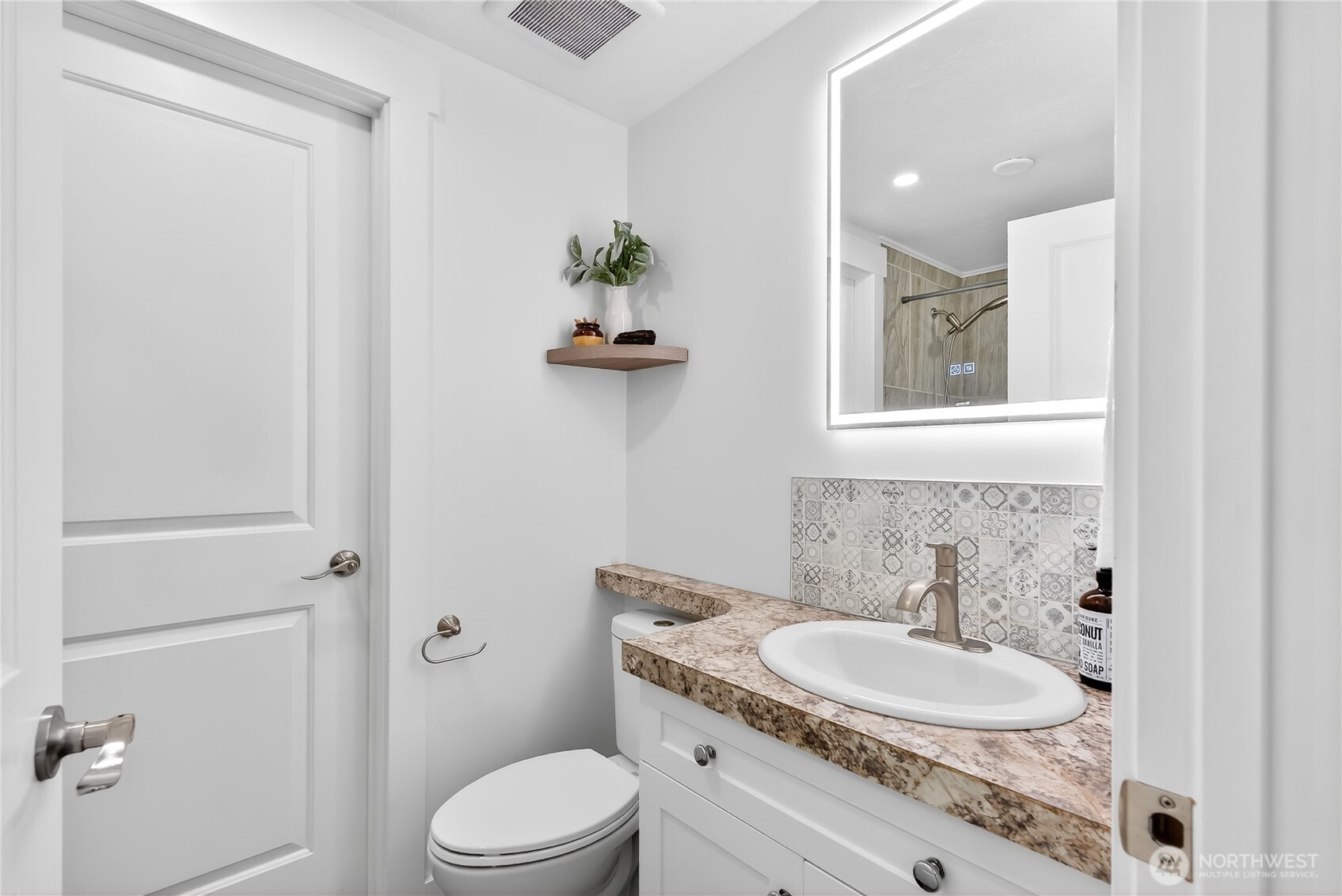 6583 Goodwin Road Everson, WA 98247 - Photo 22 of 40 a bathroom with a sink a toilet and shower