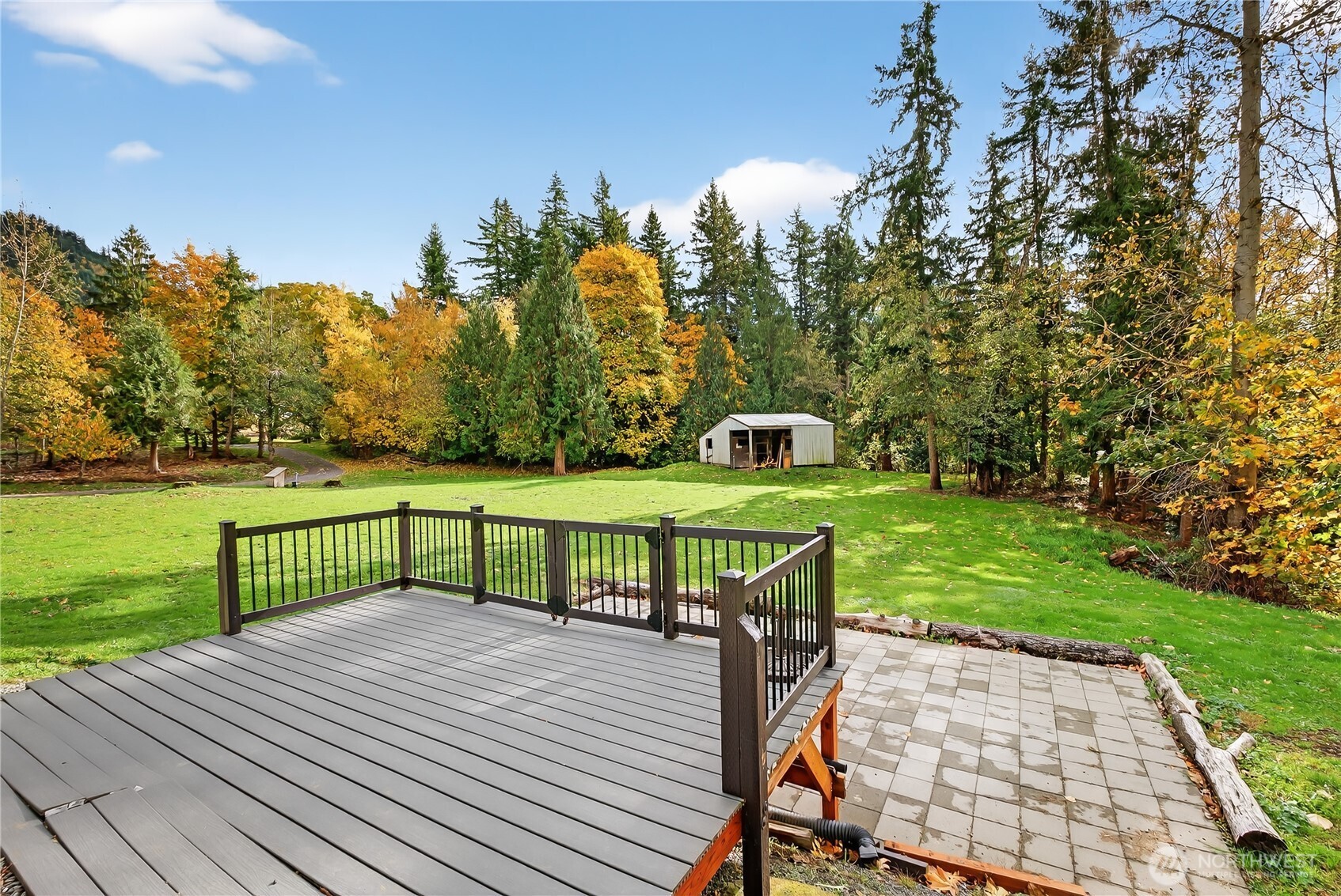 6583 Goodwin Road Everson, WA 98247 - Photo 28 of 40 a view of a table and chairs on the roof deck