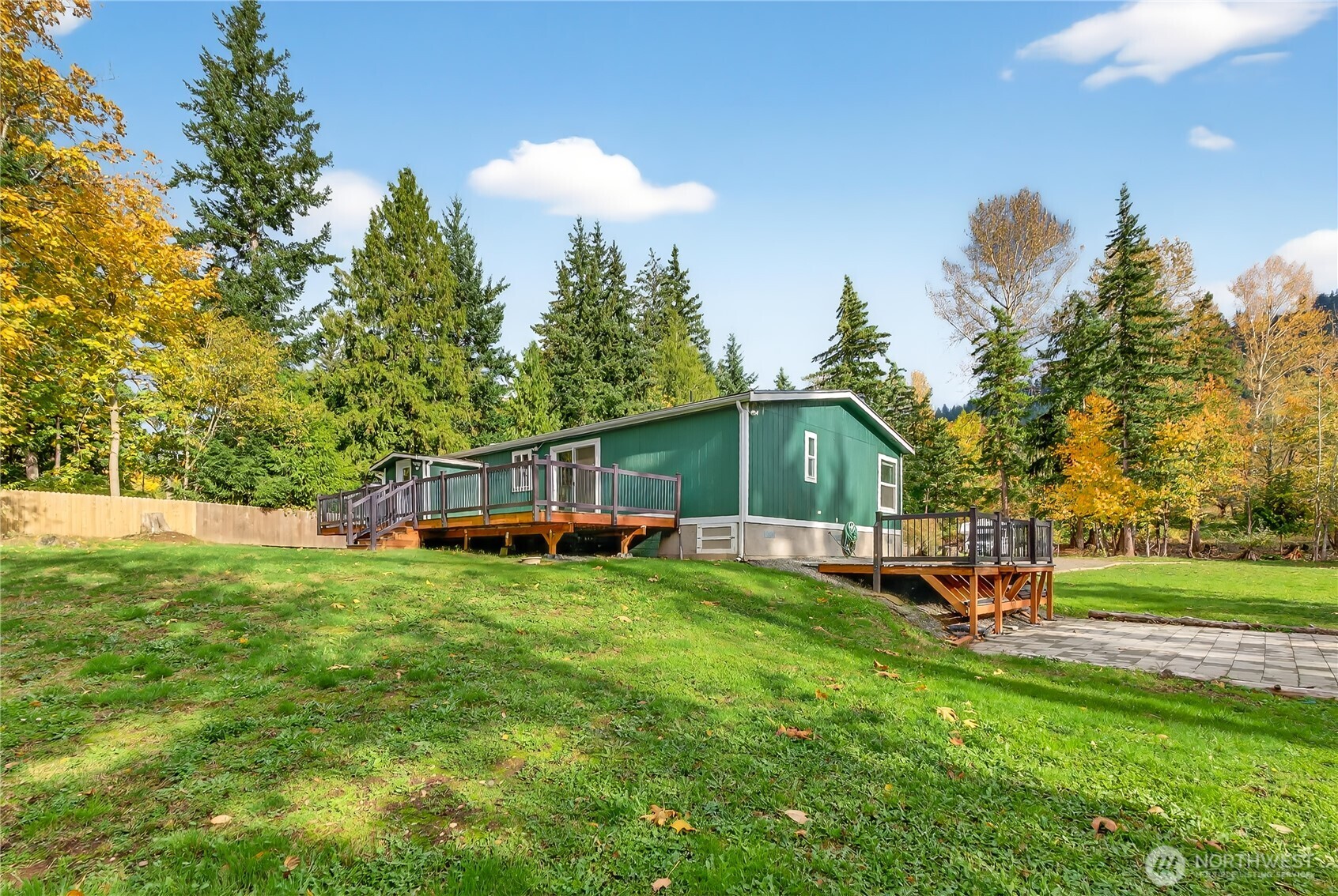 6583 Goodwin Road Everson, WA 98247 - Photo 32 of 40 a view of a house with a yard and sitting area