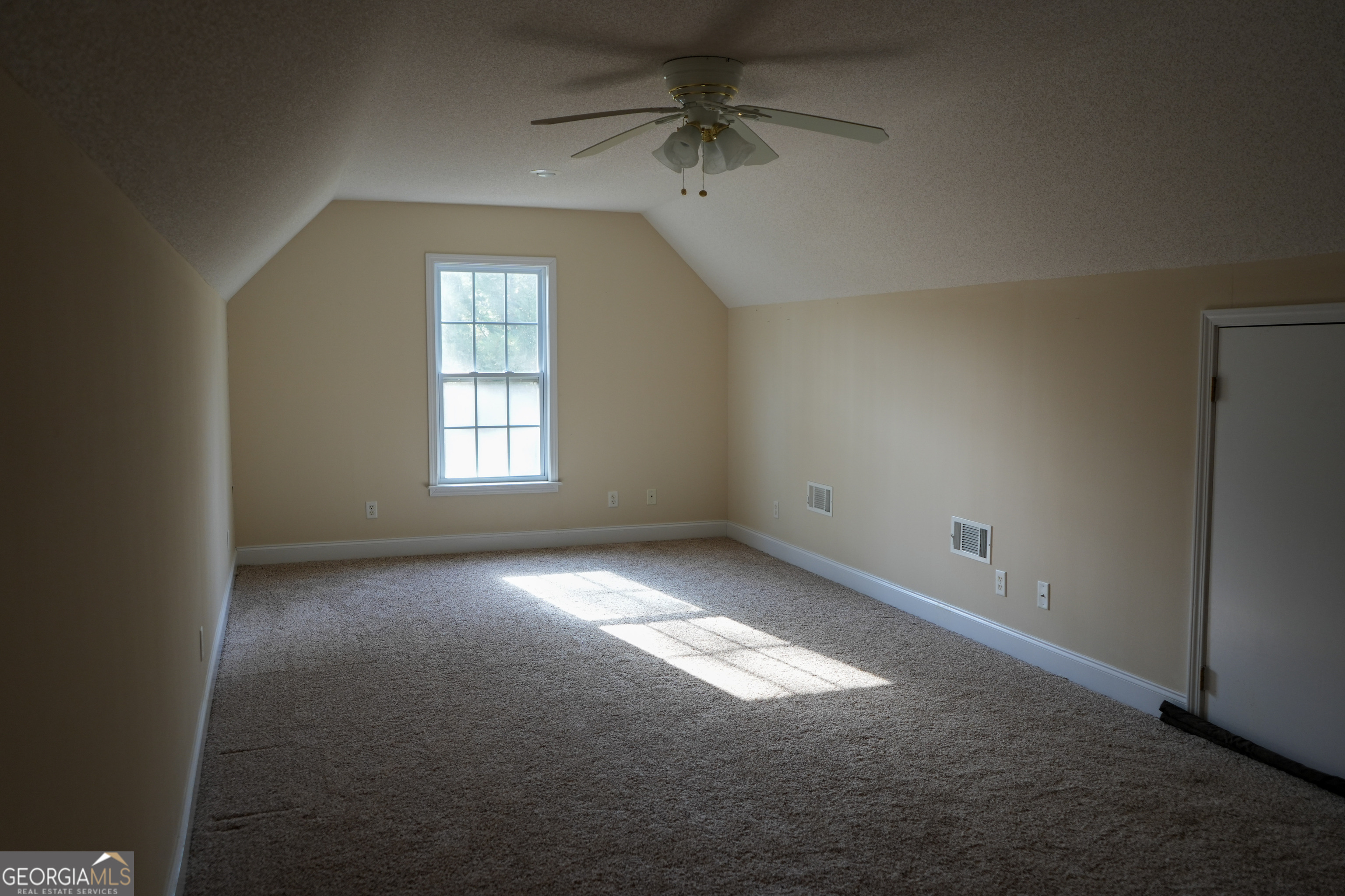 1293 Payne Road Rentz, GA 31075 - Photo 24 of 40 an empty room that has a window in it