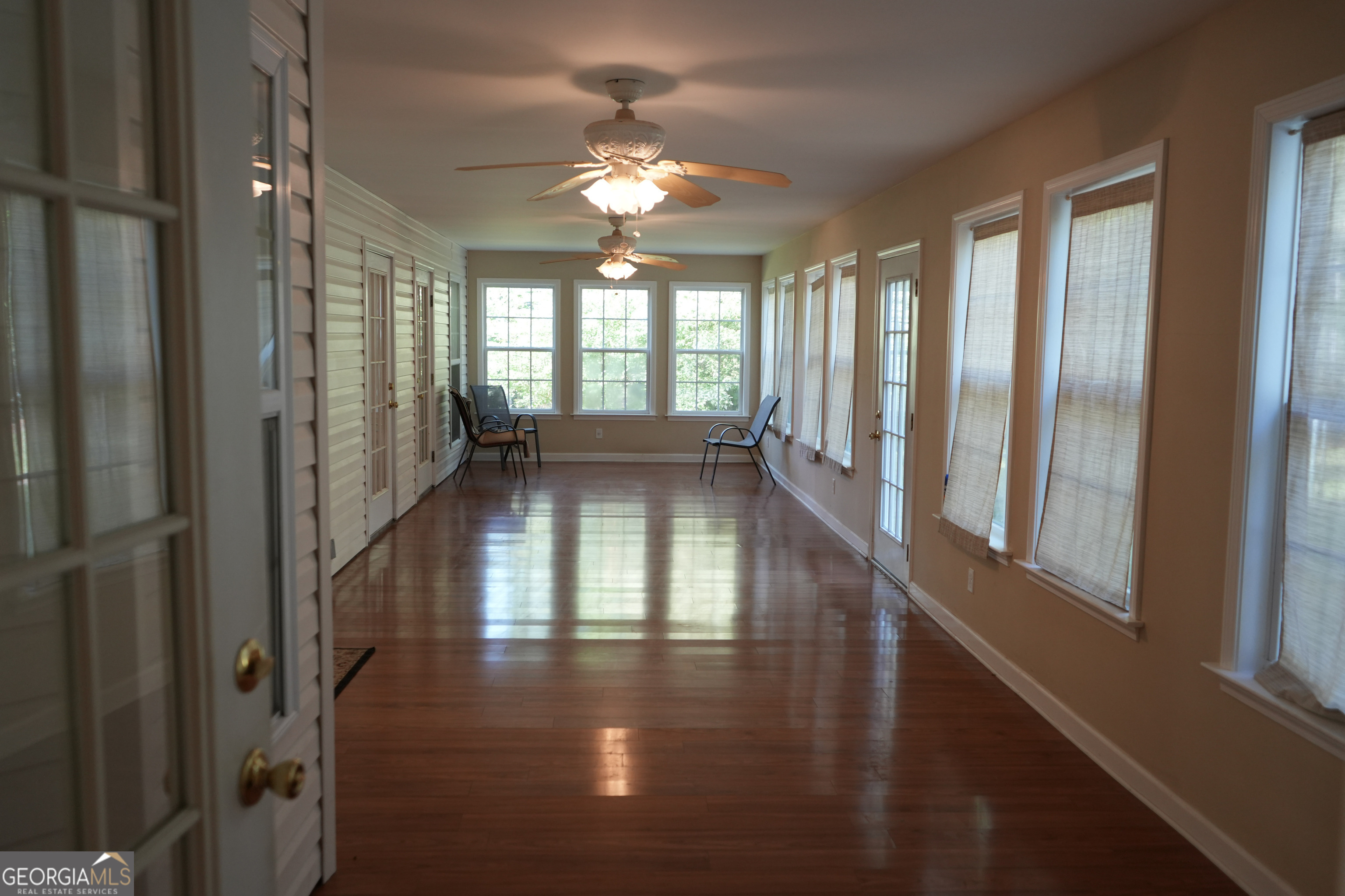 1293 Payne Road Rentz, GA 31075 - Photo 30 of 40 a view of an entryway with wooden floor and door