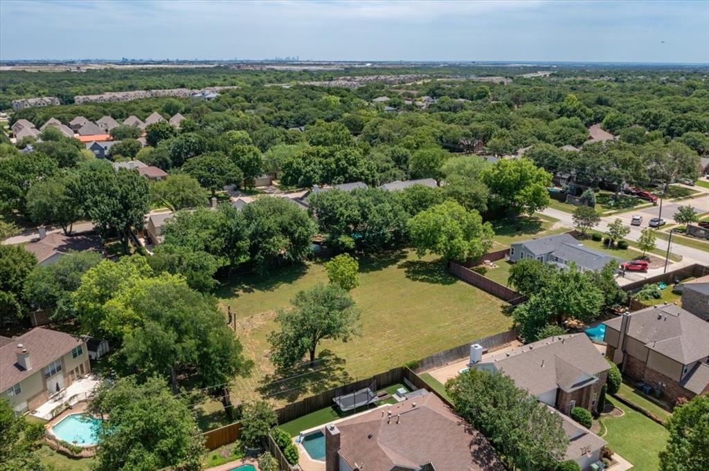 1000 Hughes Road Grapevine, TX 76051 - Photo 15 of 15 an aerial view of green landscape with trees houses and mountain view