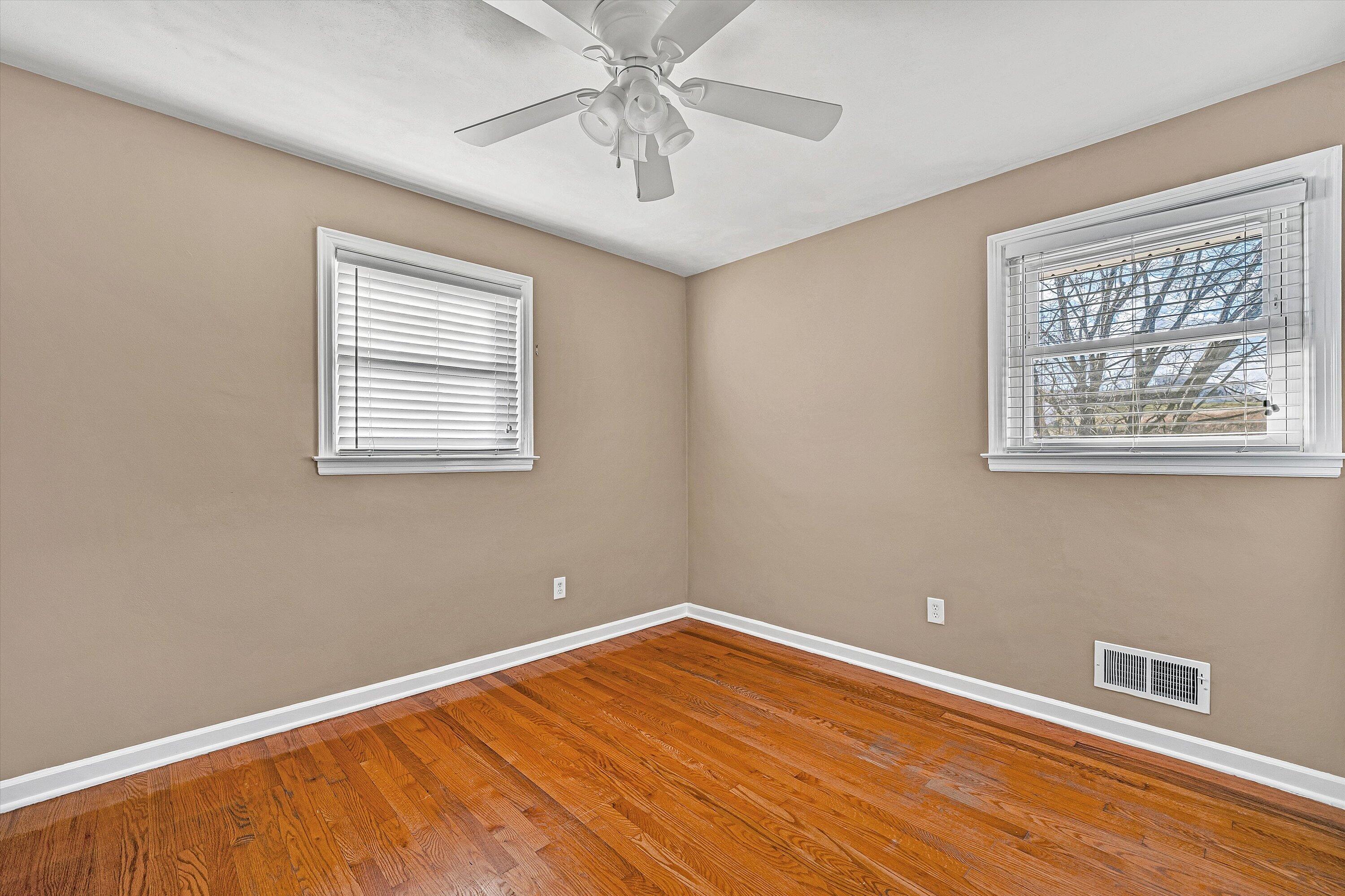 519 Doyle Street Salem, VA 24153 - Photo 18 of 40 a view of room with window and ceiling fan