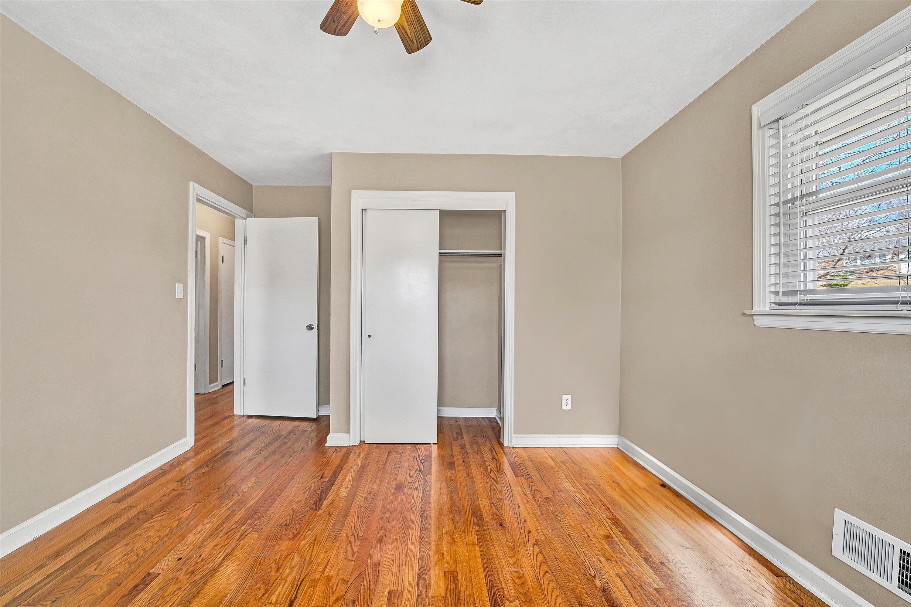 519 Doyle Street Salem, VA 24153 - Photo 21 of 40 wooden floor in an empty room with a window