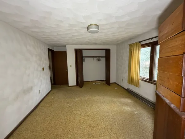 an empty room with windows