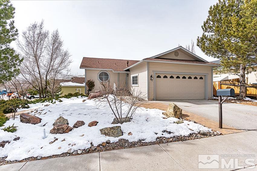530 Tarn Way Reno, NV 89503 - Photo 1 of 25 a front view of a house with a yard