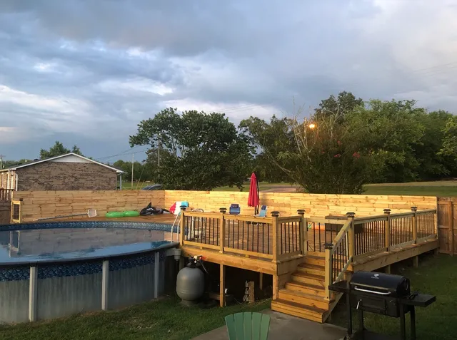 a view of roof deck with patio