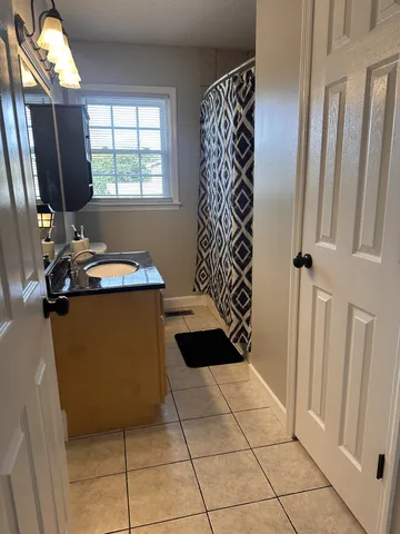 a room with window and furniture