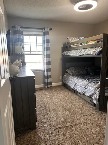 a view of fireplace and window