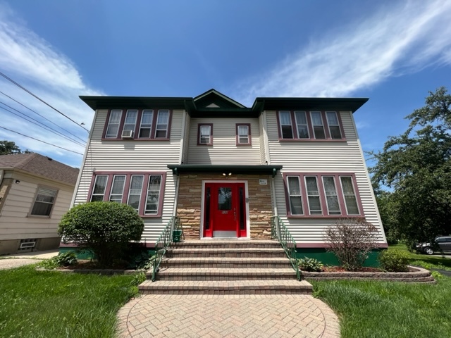 532 South Street Elgin, IL 60123 - Photo 1 of 43 a front view of a house with garden