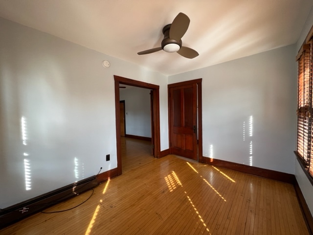 532 South Street Elgin, IL 60123 - Photo 29 of 43 a view of a livingroom with a chandelier furniture and a ceiling fan