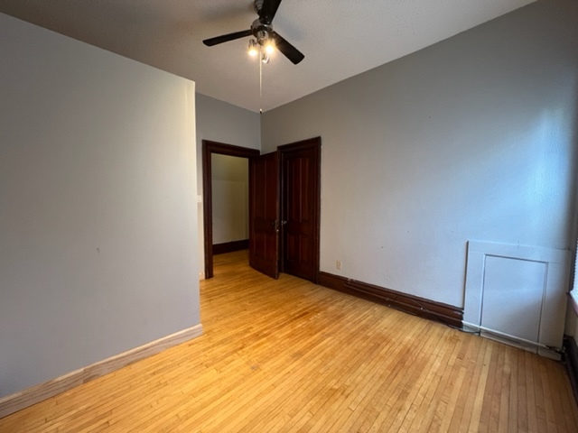 532 South Street Elgin, IL 60123 - Photo 32 of 43 a view of an empty room with wooden floor