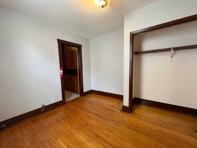 532 South Street Elgin, IL 60123 - Photo 5 of 43 a view of an empty room with wooden floor