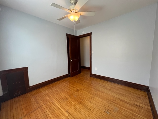 532 South Street Elgin, IL 60123 - Photo 8 of 43 a view of room with window and ceiling fan